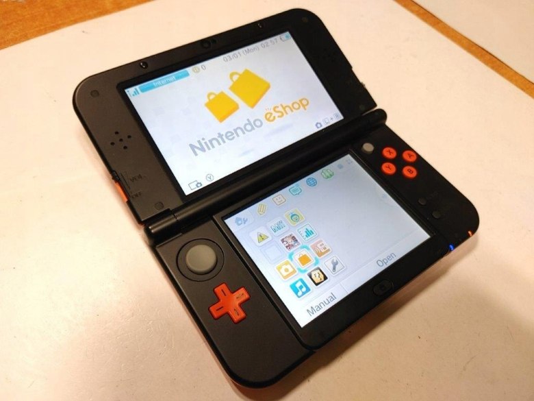 KONSOLA NEW NINTENDO 3DS XL POMARAŃCZOWO-CZARNA + RYSIK +
